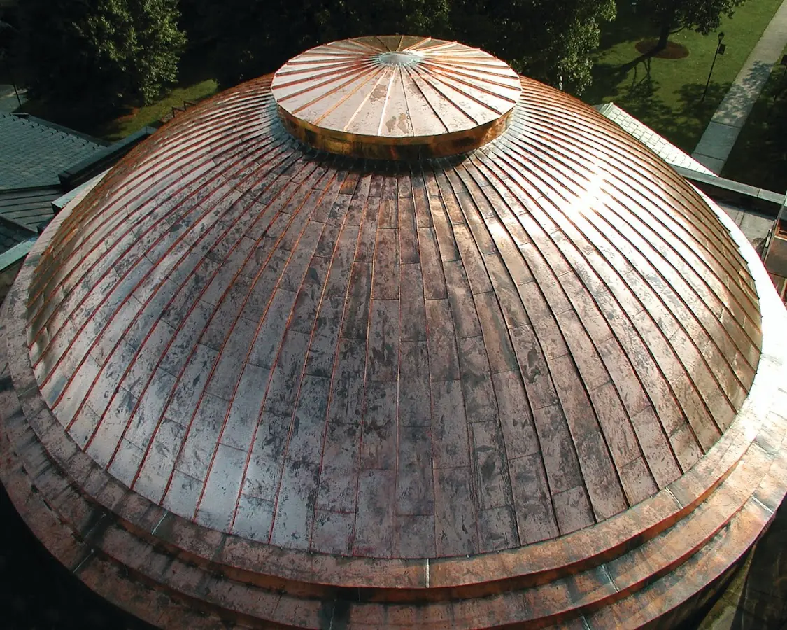 Craftsman Roofing crew installing a new roof in Orchard Point at Piney Orchard